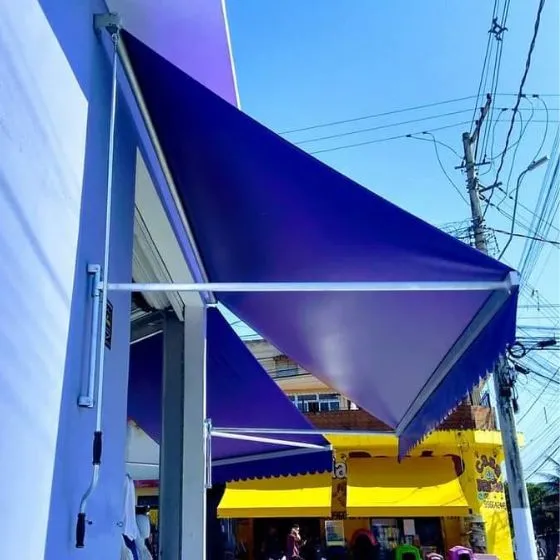 Toldo Cortina com Braços Laterais em Centro, Vargem Grande Paulista SP Toldo Cortina com Braços Laterais em Centro, Vargem Grande Paulista SP — Instalação em garagem residencial